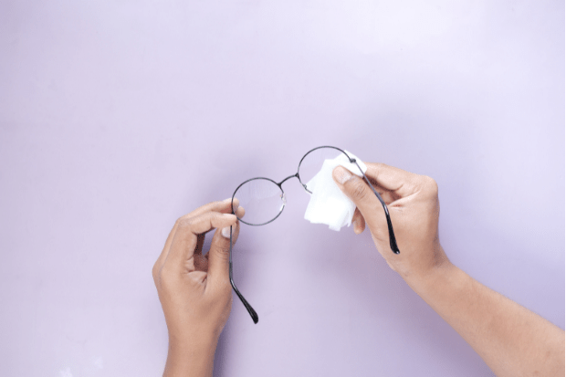 Removing glue from glasses with soapy water